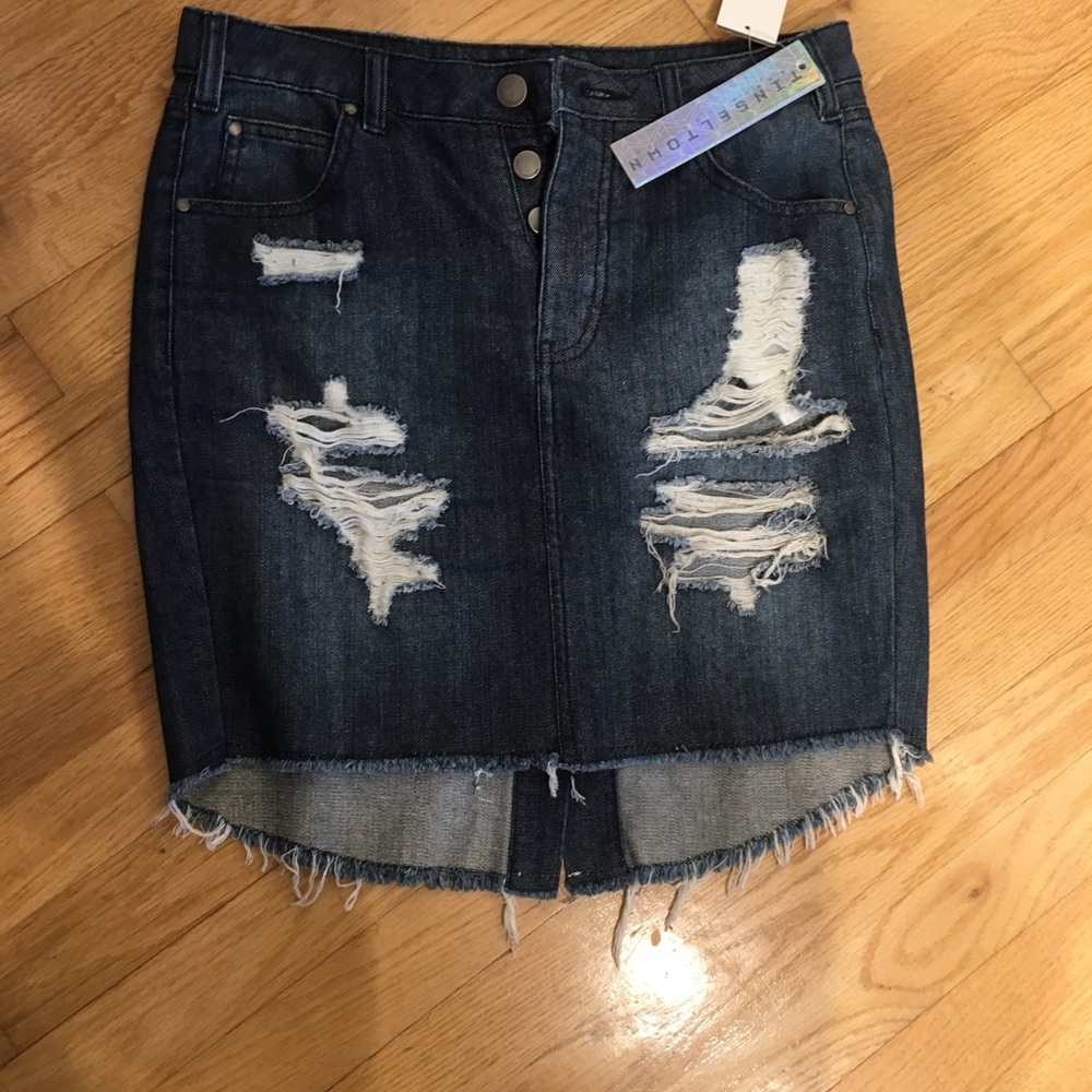 Women’s distressed denim skirt